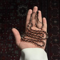 مسباح فاتوران شفاف خيط اسود