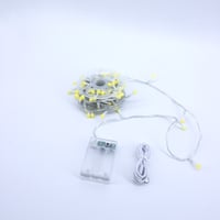 عقد اضاءة بطاريات