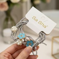 ربطة شعر تجمع ربطة الشعر الأنيقة هذه بين الأناقة و...