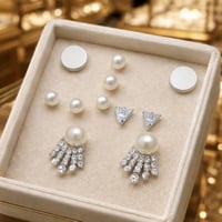 حلق نسائي نواعم لون فضي مجموعة حلق أنيق و ناعم اقر...