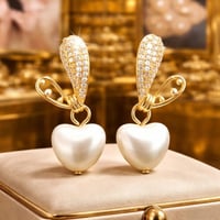 حلق نسائي ناعم لون ذهبي حلق أنيق و ناعم مرصع بالزر...