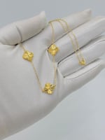 عقد تصميم عالمي ذهب عيار 18