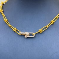 عقد تصميم عالمي ذهب عيار 21