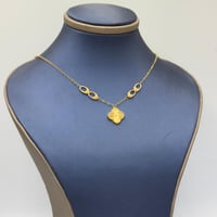 عقد تصميم عالمي ذهب عيار 21