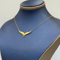 عقد جناح الصقر ذهب عيار 21