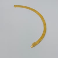 اسوارة تصميم عالمي ذهب عيار 21