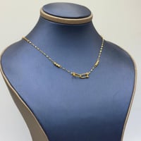 عقد تصميم عالمي ذهب عيار 18