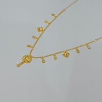 عقد ياسمينة جابر ذهب عيار 21