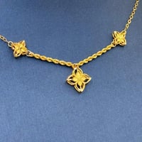 عقد تصميم عالمي ذهب عيار 21