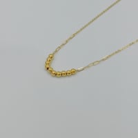 عقد كرات ذهب عيار 18