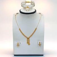 طقم شبكة تصميم عالمي ذهب عيار 21