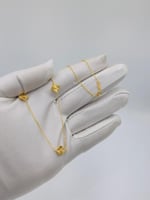 عقد تصميم عالمي ذهب عيار 21