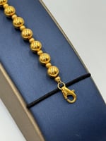 اسوارة كرات ذهب عيار 21