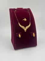 طقم جناح الصقر ذهب عيار 21