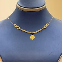 عقد جنيهات ذهب عيار 21