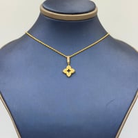 عقد تصميم عالمي ذهب عيار 21