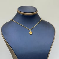 عقد تصميم عالمي ذهب عيار 21