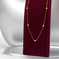 عقد كرات ذهب عيار 21