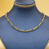 عقد تصميم عالمي ذهب عيار 18