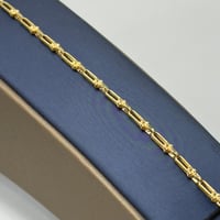 اسوارة تصميم عالمي ذهب عيار 18