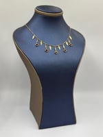 عقد تصميم عالمي ذهب عيار 18