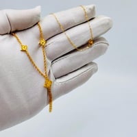 عقد تصميم عالمي ذهب عيار 21