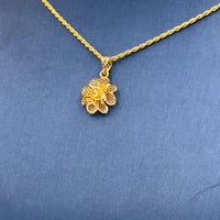 عقد وردة ذهب عيار 21