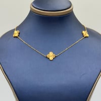 عقد تصميم عالمي ذهب عيار 21