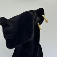 حلق تصميم عالمي ذهب عيار 18