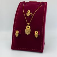 طقم الطاووس ذهب عيار 21