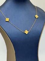 عقد تصميم عالمي ذهب عيار 21