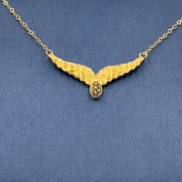 عقد جناح الصقر ذهب عيار 21