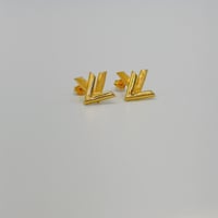 حلق تصميم عالمي ذهب عيار 18