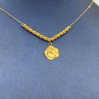 عقد وردة ذهب عيار 21