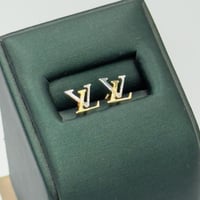 rحلق تصميم عالمي ذهب عيار 18