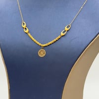 عقد جنيهات ذهب عيار 21