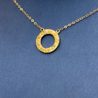 عقد تصميم عالمي ذهب عيار 21