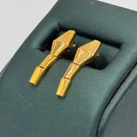 حلق تصميم عالمي ذهب عيار 21