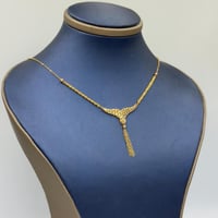 عقد جناح الصقر ذهب عيار 21