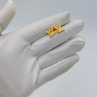 حلق تصميم عالمي ذهب عيار 18