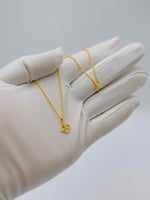 عقد تصميم عالمي ذهب عيار 21