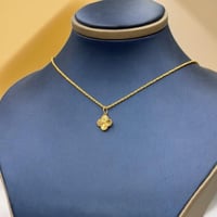 عقد تصميم عالمي ذهب عيار 21