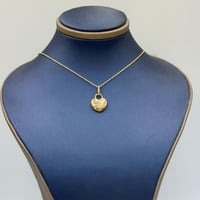 عقد تصميم عالمي ذهب عيار 18