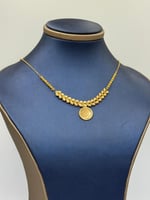 عقد جنيهات ذهب عيار 21