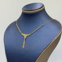 عقد جناح الصقر ذهب عيار 21