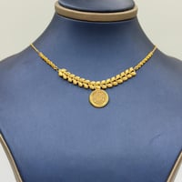 عقد جنيهات ذهب عيار 21