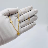 عقد تصميم عالمي ذهب عيار 21