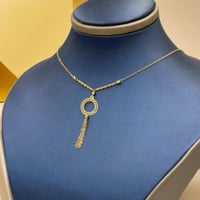 عقد تصميم عالمي ذهب عيار 21