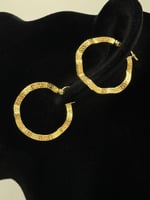 حلق تصميم عالمي ذهب عيار 18