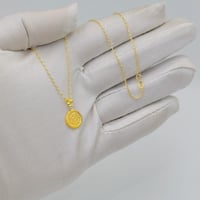 sعقد جنيهات ذهب عيار 18